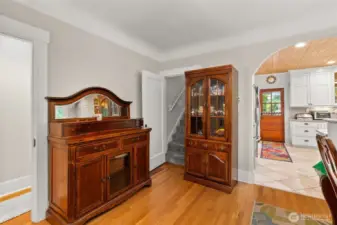 Adjacent to the dining area are the stairs to upper level.