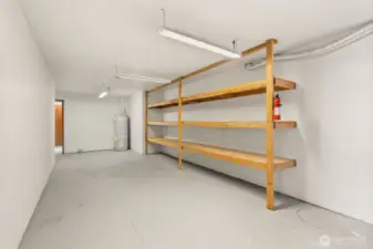 Lower level storage showing one of two hot water tanks
