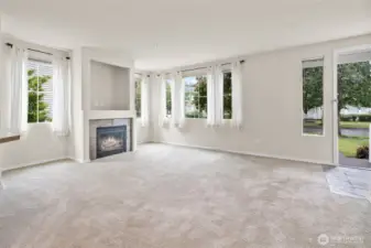 Come on in! Light and bright living space with an abundance of windows.