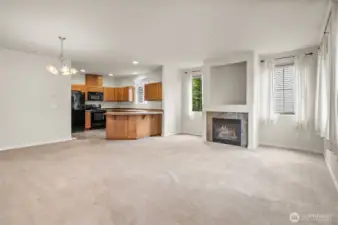 Gas fireplace brings winter warmth and ambiance to the open concept floor plan.