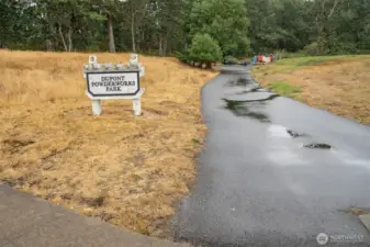 PowderWorks Park is 24 acres with the park space uniquely weaving through groves of Garry Oak woodlands and restored prairie.