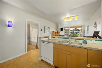 View of kitchen overlooking the living room