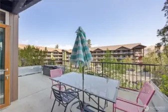 Large patio with table and chairs