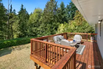 Newly rebuit deck overlooks the back yard.