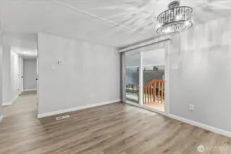 Glass sliding leads to carport and backyard