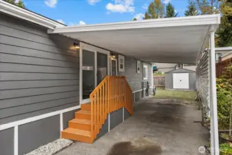 Deep carport big enough for 3 cars and Storage Shed