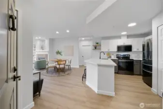 Fresh flooring throughout, updated quartz counters and fresh fixtures.