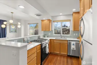 Cheerful Kitchen with Beautiful Quartz Countertops & Gas Stove!
