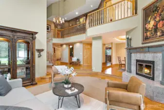 Wood fireplace in entry living space.