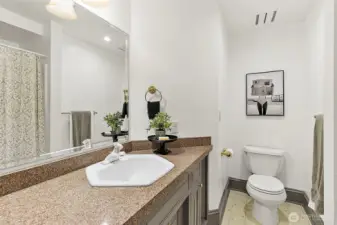 En-suite bathroom connected to bedroom.