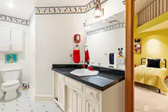 En-suite bathroom connected to bedroom.