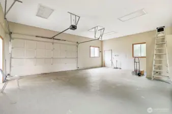 Deep garage space inside shop.