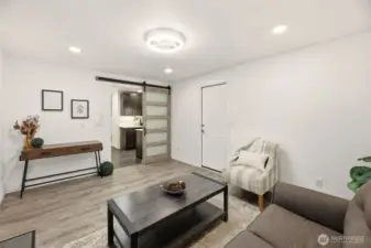 Flex space leads to garage. W/D in garage