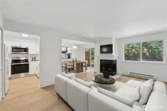 Virtual Stage - Living room w/ view of kitchen & dining