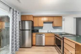 Kitchen with newer appliances.