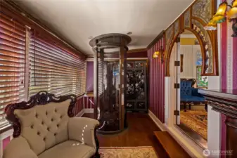 Pneumatic elevator that goes between the first & second floors.