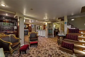 Lower level lives like a private ADU or luxurious guest quarters, with a second kitchen, laundry, fireplace & spa-inspired bathroom.