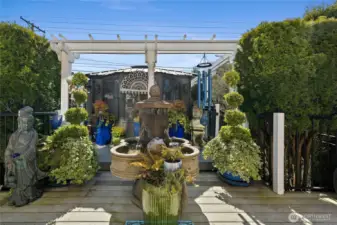 Swim spa enclosure in the rear of picture.