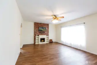 Living room. Bright and cheery.  Warm Sunsets would come in from picture window.