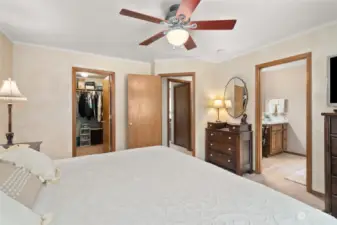 Right door leads to ensuite bathroom, large walk in closet to the left.