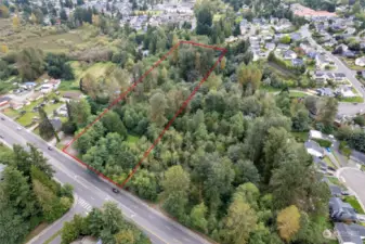 Shy 5 acre parcel - Zoned R6 with 1,608sf home built in 1938. The red outline shows approximate property boundaries. Buyer to satisfy all information to their satisfaction. Back of property has street access via 120th Ave SE.