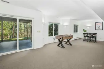 Sliding glass door to the patio/backyard. NEW windows installed in this home in 2021.