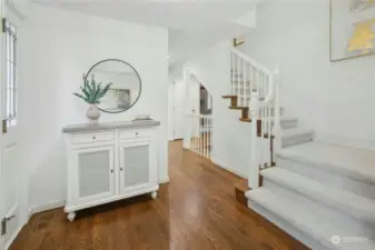 Rich, solid hardwood floors greet you upon entry.