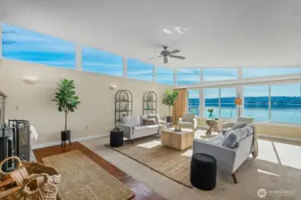 Bright, beachy, and wide open! Wall of windows brings the view right into your living room—perfect flow to the kitchen and dining too.