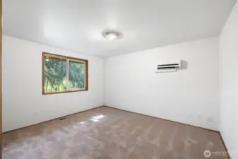 First guest bedroom with double closet.