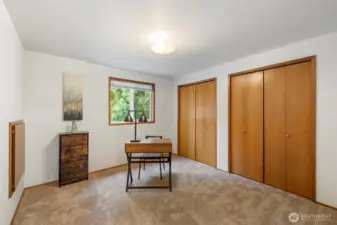 Second guest bedroom with double closet.