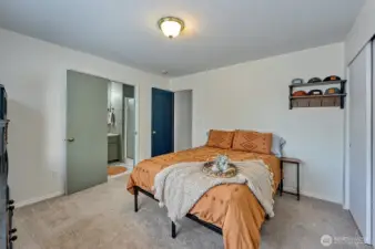 Primary bedroom with 3/4 bathroom and double closets!