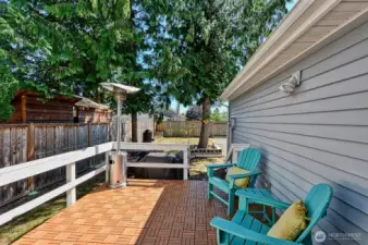 Back deck with large, fully fenced yard.