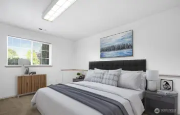 Downstairs front bedroom - virtually staged.