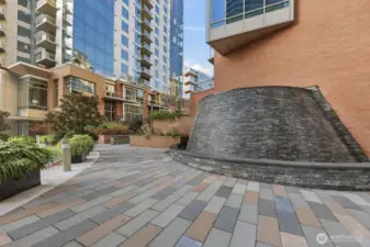 Relax outside the buildings entrance with the tranquil sounds of the large outdoor fountain.