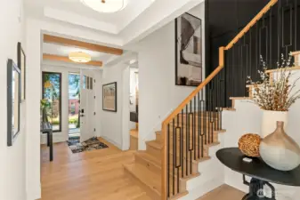 Dramatic entry with wood beams