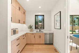 Pantry with cabinets and extra dishwashers