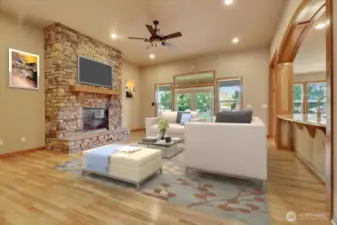 Stone to ceiling gas fireplace with 9 ft ceilings (Virtually Staged)