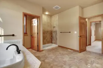 Walk-in shower in primary and privacy room