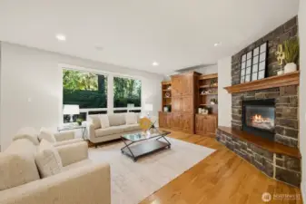 Family room w/ a gas fireplace for cozy winter nights.