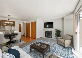 Living room. Real Wood Fireplace for those chilly NW days. Digital staging