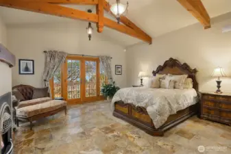 Primary suite is an elegant private oasis. Grand views of the straits and beyond, from your bed or on your Juliette balcony. Imagine your first cup of coffee here?