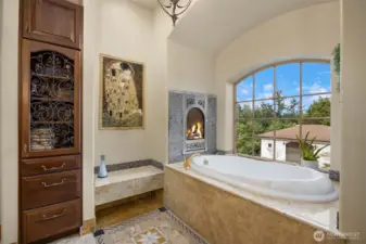 Imagine this elegant soaking tub complete with a gas burning fireplace. Grand way to relax!