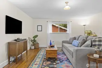 Mid century touches can be found throughout in the era-friendly elevated windows and stone entry.