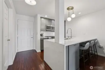 This top floor south-facing unit is set in one of Seattle's most favorite neighborhoods, and is outfitted with gorgeous details at every turn.