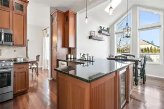 Kitchen in the heart of the home. Lots of natural light from windows & skylights. Vaulted ceiling. Dinning to left. Breakfast nook to right.