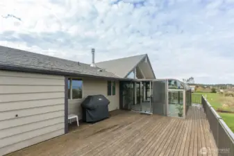 large deck with sunroom