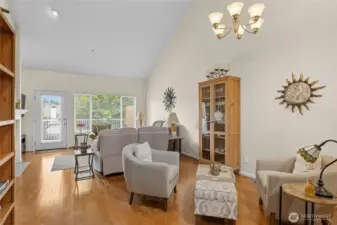 Open and airy living room with vaulted ceilings.