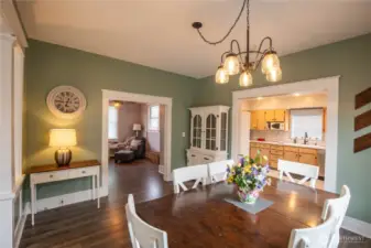 The large open dining room flows to the flex room and kitchen.