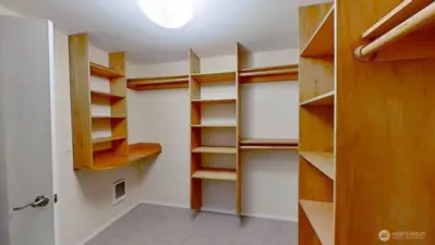This walk-in closet is accessed either by the 2nd bedroom or could be accessed from the primary bedroom for an even larger primary closet.