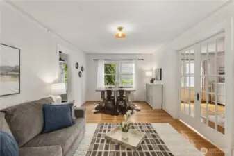 French doors separate living areas and bedroom.